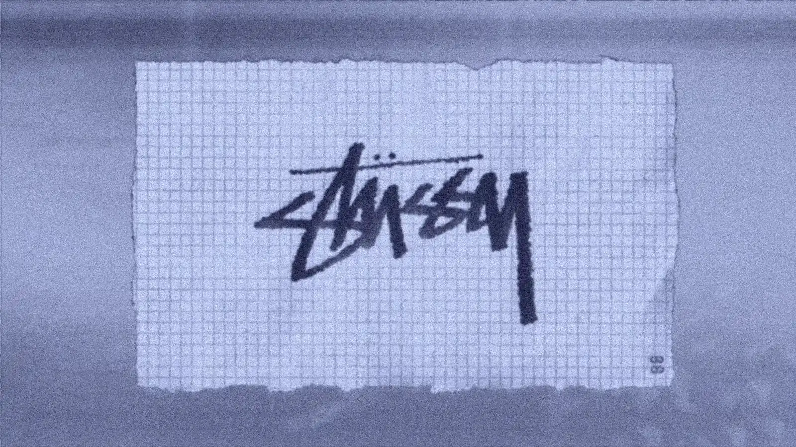 Stüssy signature logo on a torn sheet of grid paper, still from the 3D film